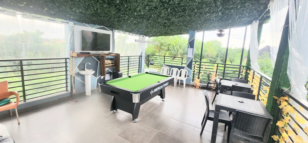 The HIXS Open Bar at LUJ — pool table and open-air seating